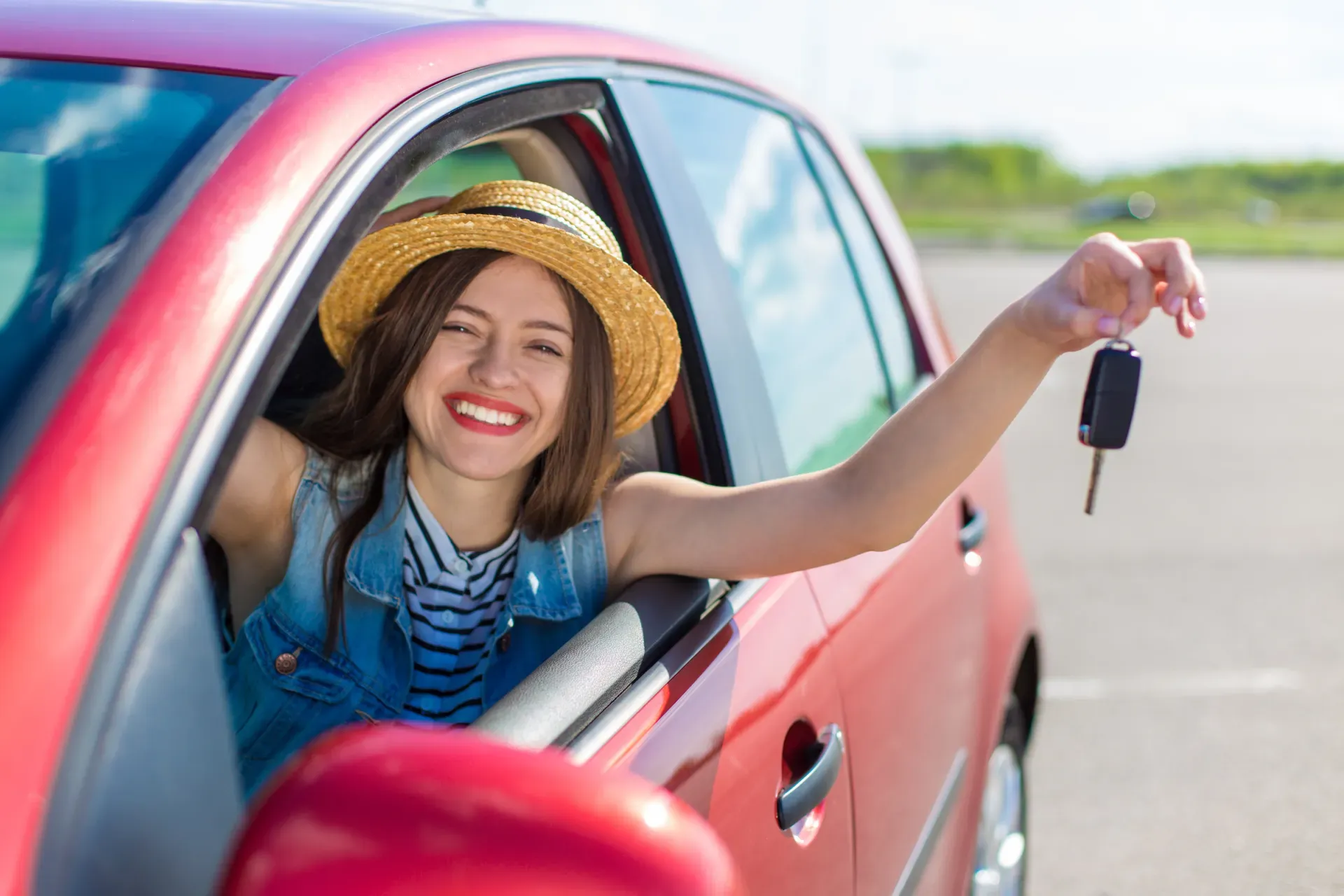 Driver-Woman-Smiling-Showing Driver-Woman-Smiling-Showing