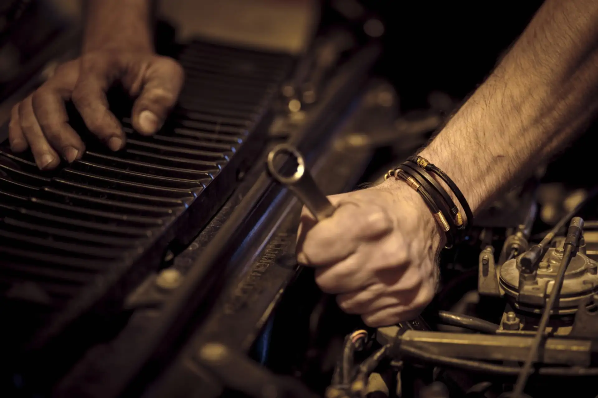 a man-fixing-gear-machine